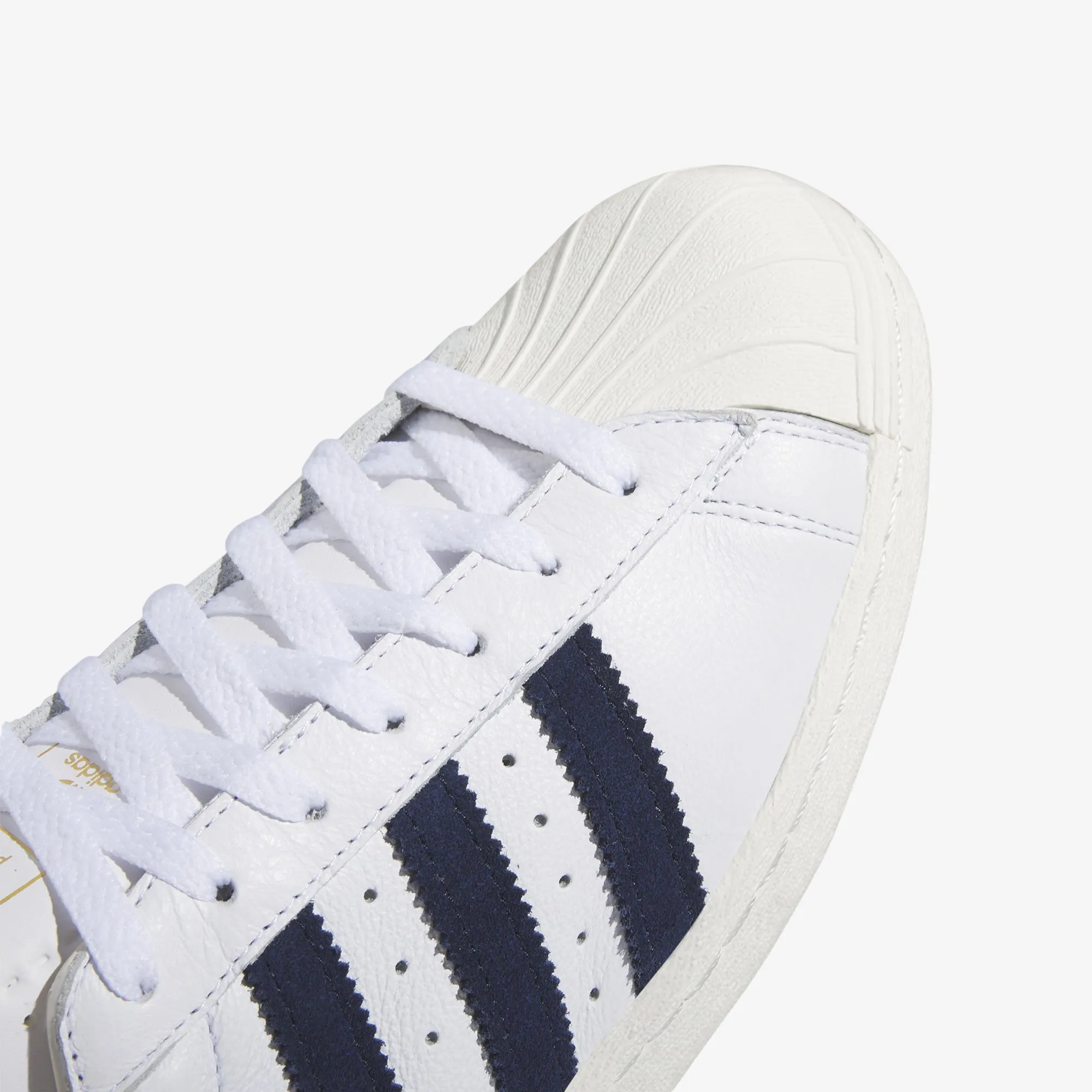 Adidas Originals | POP TRADING CO SUPERSTAR ADV TRAINERS  { CLOUD WHITE/NAVY/CHALK WHITE